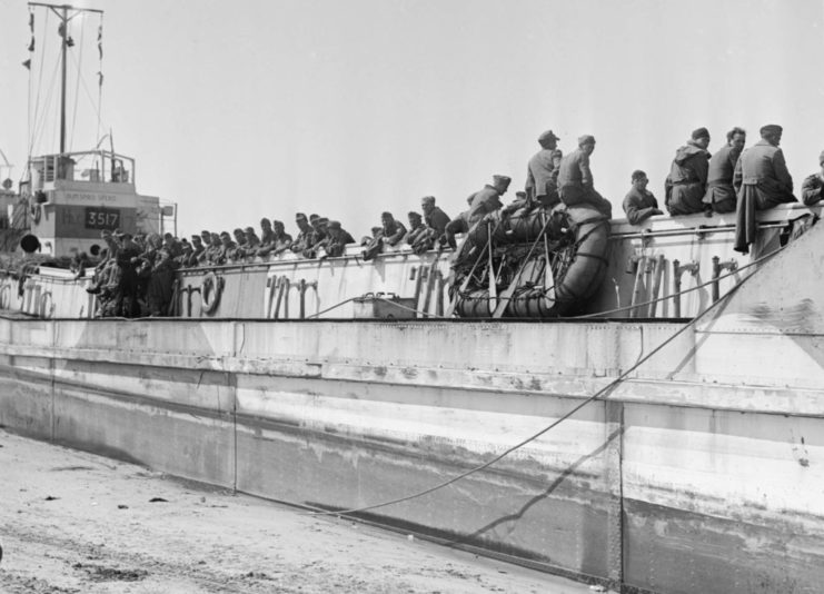 LCT 7074 on Gold Beach June 7 1944. Loaded with German prisoners.