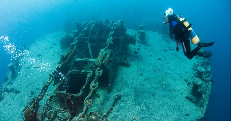 A diver explores the upper deck of SS Thistlegorm.  Hagainativ - CC BY-SA 3.0