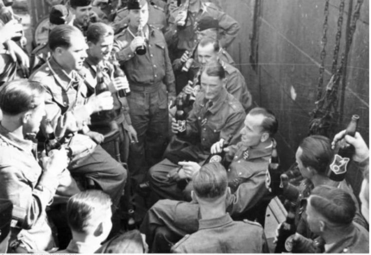 Otto Kretschmer celebrating his Knight’s Cross with his U-99 crew in 1940 By Bundesarchiv – CC BY-SA 3.0 de