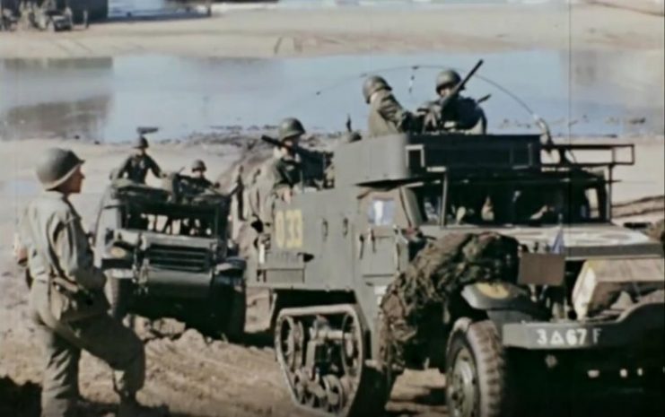 American soldiers head toward shore after landing in France. Public Domain / mediadrumworld.com