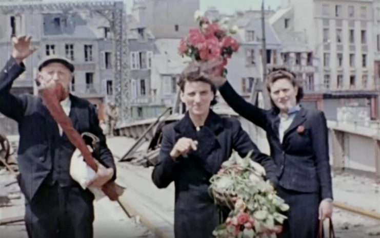 Citizens of Cherbourg show their gratitude at being liberated from Nazi rule. Public Domain / mediadrumworld.com
