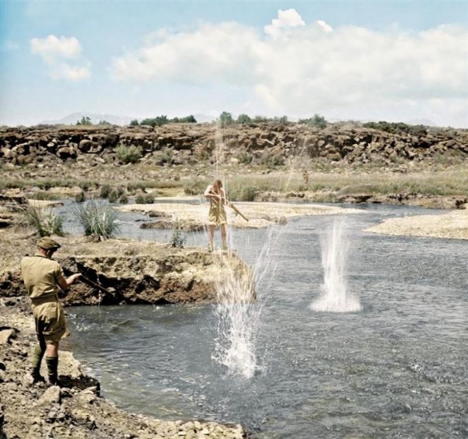 NZ soldiers trout fishing using rifles near the Syrian and Turkish border, 9 July 1942. Paul Reynolds / mediadrumworld.com