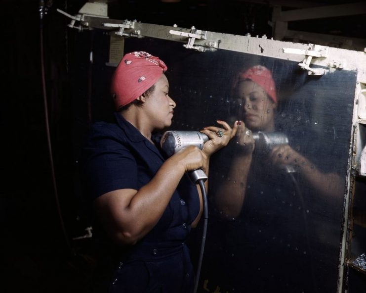 “Rosie the Riveter” working on an A-31 Vengeance bomber in Nashville, Tennessee, 1943.