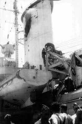 Damaged Front Funnel. By Museum archive of the Australian War Memorial