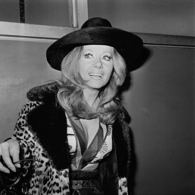 Ingrid Pitt wearing a hat