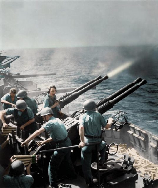 40mm guns firing aboard the U.S. aircraft carrier USS Hornet (CV-12) on 16 February 1945, as the planes of Task Force 58 were raiding Tokyo. Paul Reynolds / mediadrumworld.com