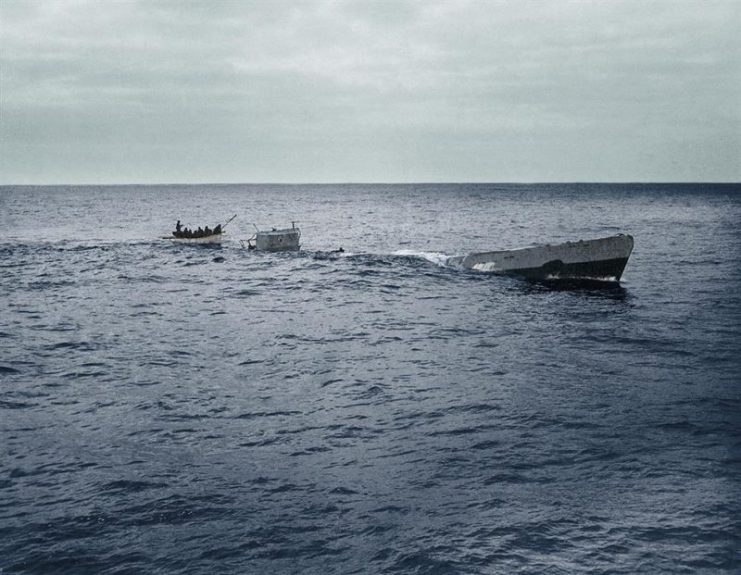 Coast Guardsmen from the cutter USCGC Spencer picking up survivors from the U-Boat U-175 just before it made its final dive. Meanwhile Convoy HX-233 steamed on. April 17, 1943. Paul Reynolds / mediadrumworld.com