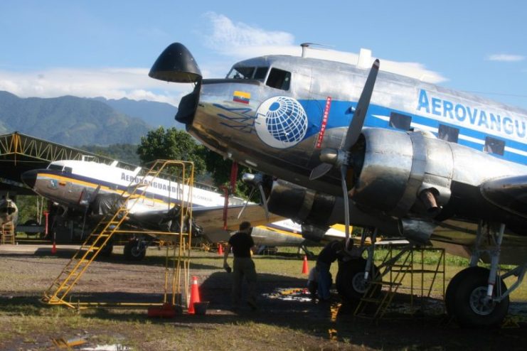 Photo above was taken during one of my visits to the Capital of DC-3, Villavicencio in Colombia, the gate to the Amazon with a fleet of 10-12 Dakotas, divided over 5 companies. This was, is and will remain for long the realm of the old radial prop DC-3. Rather primitive conditions in the Jungle outback posts, cheap labor costs, a good infrastructure for the vintage Dakota, with skilled skinners, lots of mechanics and a reputed workshop for radial engine overhauls. The first DC-3 TurboProp has also made its entry here now with Aliansa.