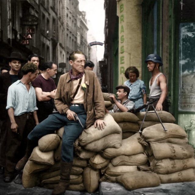 French Resistance fighters man a barricade in Paris. August-1944. Paul Reynolds / mediadrumworld.com