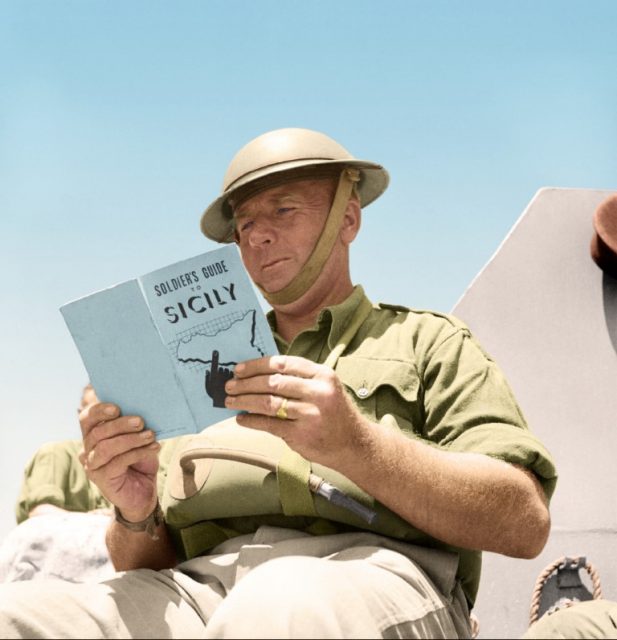 A British soldier reads up on Sicily, the target for the next Allied invasion, July 1943. Paul Reynolds / mediadrumworld.com