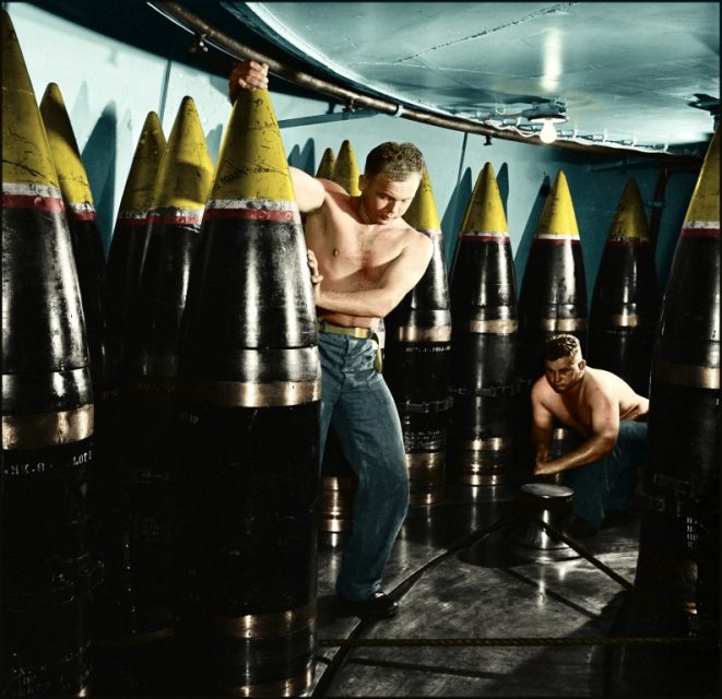 Ordnancemen moving 16″ shell from its storage stall to ammunition hoist on board the USS New Jersey. Paul Reynolds / mediadrumworld.com