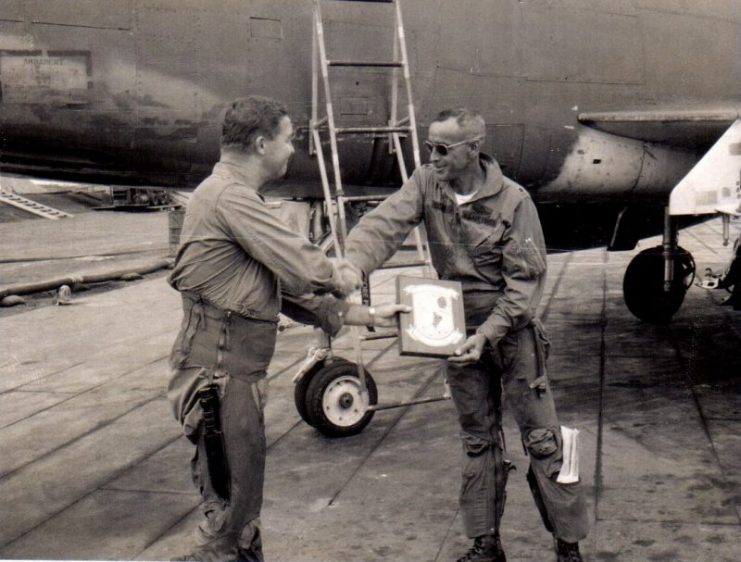 Lt. Col. Don Pittman, left, receives a plaque after completing his final flight in Vietnam on May 1, 1968. During his two tours in Vietnam, the command pilot accrued 385 combat hours in an F-100D Super Sabre. Courtesy of Debbie Pash- Boldt.