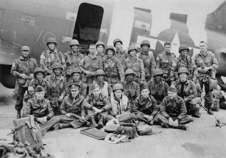 US Army Pathfinders and USAAF flight crew before D-Day, June 1944, in front of a C-47 Skytrain at RAF North Witham