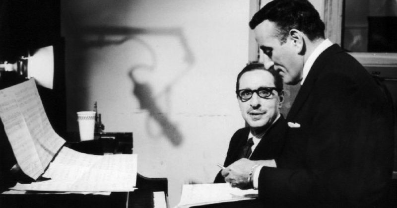 Photo of composer Harold Arlen and singer Tony Bennett rehearsing for the television program The Twentieth Century.