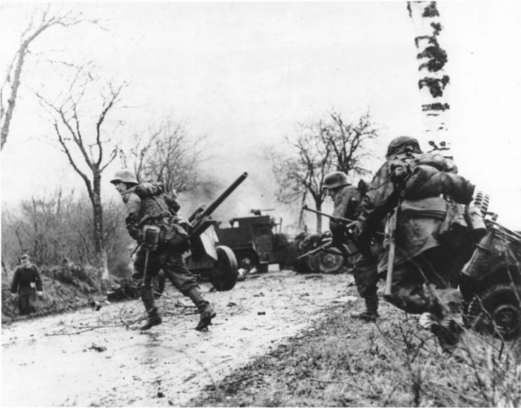 Panzergrenadier-SS Kampfgruppe Hansen in action during clashes in Poteau against Task Force Myers, 18 December 1944.