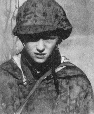 Warsaw Uprising: Young polish courier from Starówka district wearing German Wintertarnwendejäcke M42 uniform.