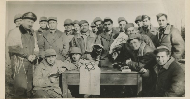 Rabbi Chaplain Robert Marcus with Jewish soldiers. 1944. Credit: Tamara Green and Roberta Marcus Leiner