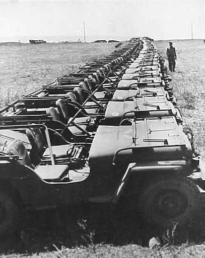 Jeeps lined up in France awaiting shipment to the Pacific