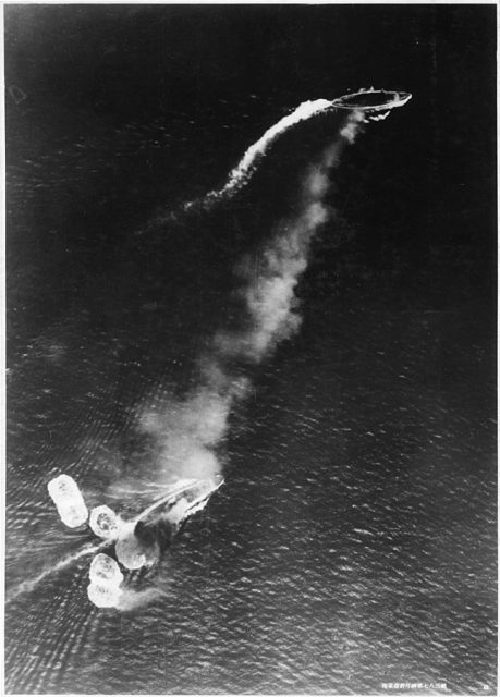 Repulse is at the bottom, having been hit by a bomb, 10 December 1941