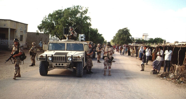 American soldiers moving down a street