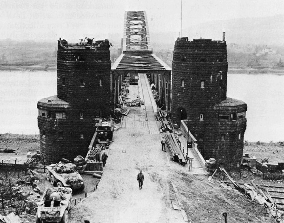 The retreating Germans heavily damaged but failed to destroy the bridge 