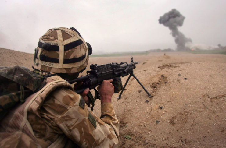 British Commando aiming his rifle