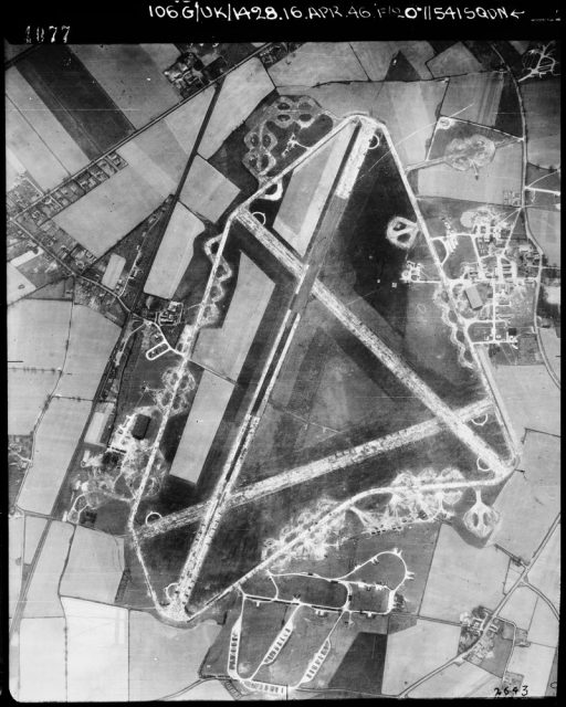 Aerial photograph of Rackheath airfield looking south, the administrative site, barracks sites and technical site with a T2 hangar is on the right, the bomb dump and ammunition dump are at the bottom, the fuel store, firing butts and second T2 hangar are on the left, 16 April 1946. Photograph taken by No. 541 Squadron, sortie number RAF/106G/UK/1428. English Heritage (RAF Photography). IWM