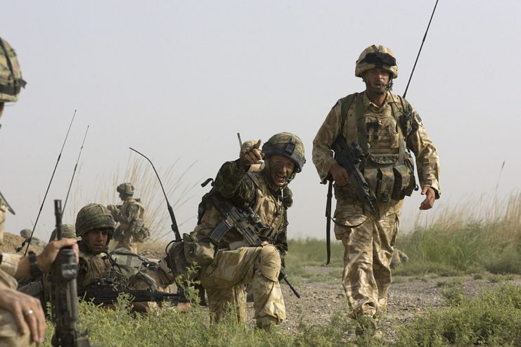 Grenadier Guardsmen walking along a trail