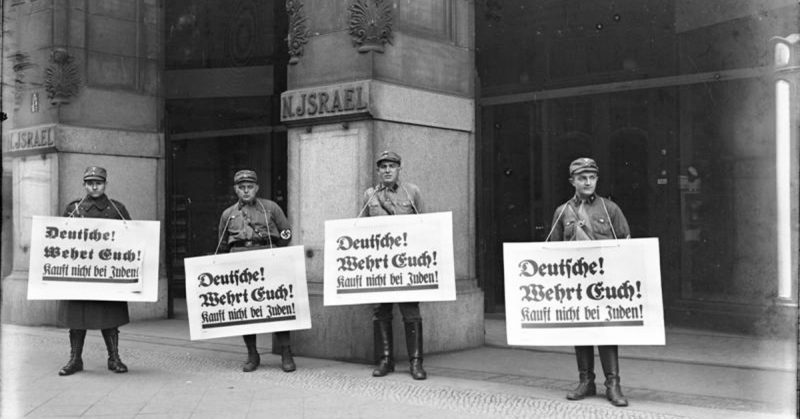  SA troopers urge a boycott outside Israel's Department Store, Berlin. By Bundesarchiv - CC BY-SA 3.0 de