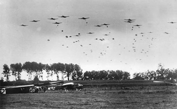 Men of the 82nd Airborne Division drop near Grave in the Netherlands during Operation Market Garden.