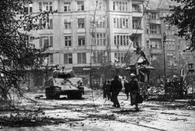 1945, May, Berlin. M4 Sherman probably from Kampfgruppe “Berlin”. On the right side of the turret a German cross?