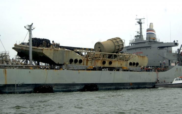 Fort Story, Va. (June 08, 2006) – The crew aboard the Transport Tanker SS Chesapeake is preparing a single anchor leg moor (SALM) to be slid over the side of the ship and during exercise Delmar. The SALM is used to keep the ship at anchor during replenishment of fuel and supplies to shore activities. DELMAR is organized by the Military Surface Deployment and Distribution Command (SDDC) and will challenge a variety of units to jointly provide humanitarian assistance to an area devastated by a natural disaster. The focus of the exercise for the month of June is based around the Hampton Roads area if it were to be hit by a major hurricane. U.S. Navy photo by Photographer’s Mate 1st Class Robert R. McRill