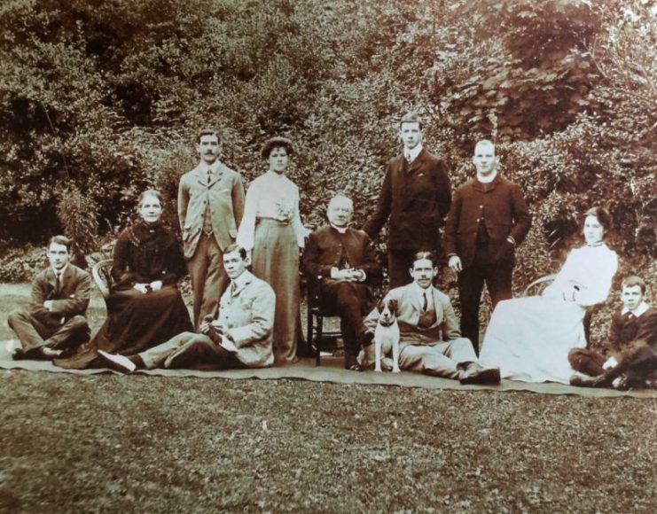 The Venerable Ernest Sandford, archdeacon of Exeter, seen at home with his large family. Francis Sandford and his brother Richard, each later to play a major role in the Zeebrugge Raid, sit cross-legged to the extreme left and extreme right respectively. Photo credits: Daniel Sandford.