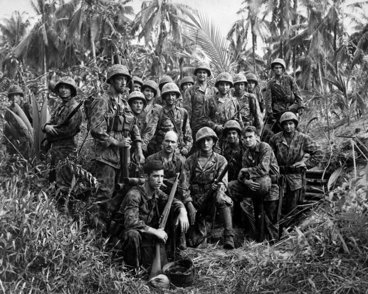 Members of the 1st Marine Raider Battalion standing together in the jungle