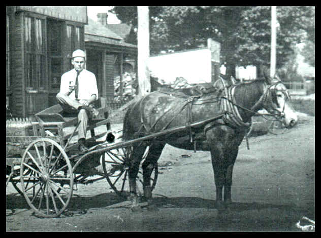 Coca-Cola horse drawn delivery wagon on the Boulevard in Leaksville, North Carolina, 1909.