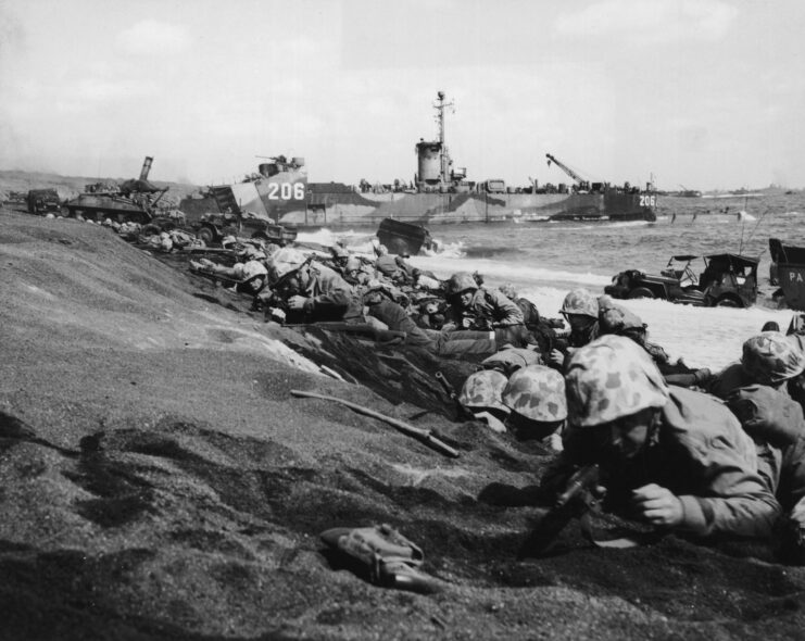 Soldiers laying on the beaches of Iwo Jima.