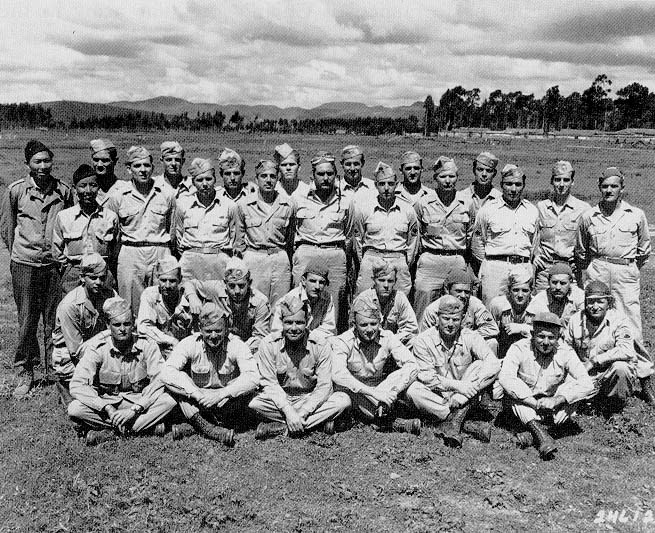 Officers and men of the OSS who instructed Chinese commandos in parachute jumping and commando tactics at the commando training camp in Kunming, China (U.S. Army photograph)