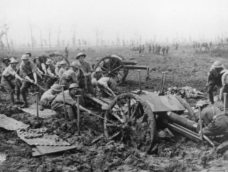 British soldiers haul an 18-pdr field gun out of the mud near Zillebeke, 1917.
