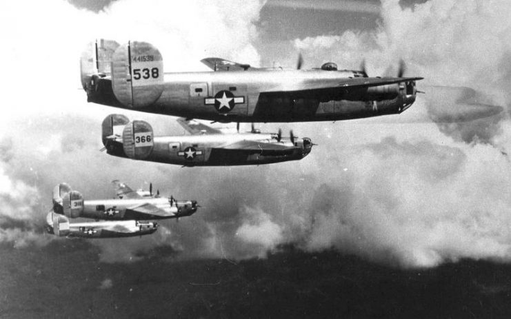 Flight of B-24 Liberators over the South Pacific.
