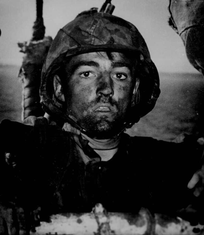 A Marine after two days and nights of Hell on the beach of Eniwetok in the Marshall Islands