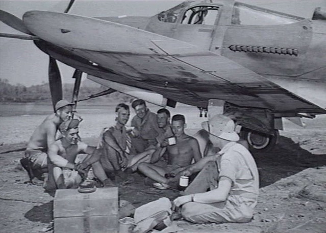 USAAF Bell P-39 Airacobra and ground crew, New Guinea, 1942.