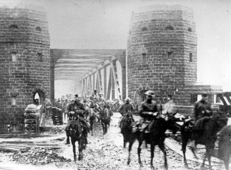 American troops cross the Ludendorff Bridge over the Rhine River at Remagen on December 13, 1918.