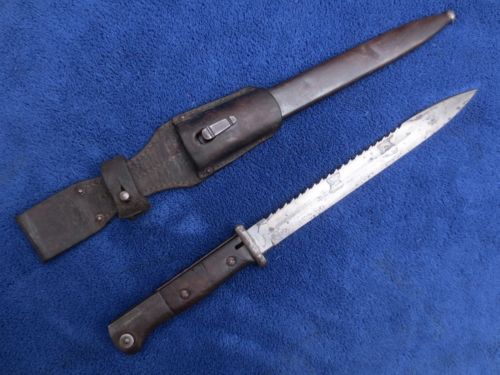 The brutal looking German bayonet with sawback blade.