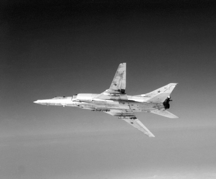 A left underside view of a Soviet Tu-22M Backfire-B bomber aircraft in flight.