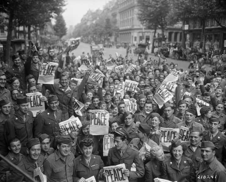 Allied military personnel in Paris celebrating V-J Day on August 15, 1945