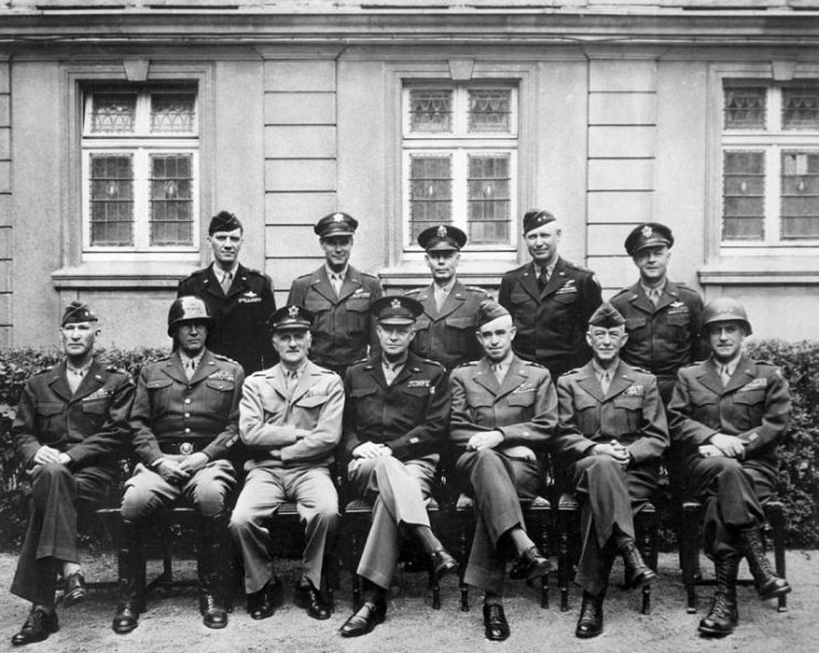 Senior American commanders of the European theater of World War II. Seated are (from left to right) Gens. William H. Simpson, George S. Patton, Carl A. Spaatz, Dwight D. Eisenhower, Omar Bradley, Courtney H. Hodges, and Leonard T. Gerow; standing are (from left to right) Gens. Ralph F. Stearley, Hoyt Vandenberg, Walter Bedell Smith, Otto P. Weyland, and Richard E. Nugent.