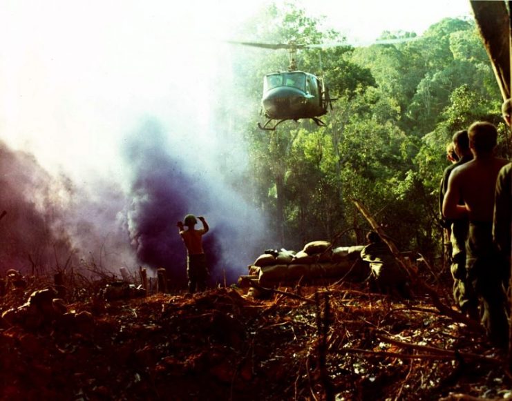 A U.S. Army Bell UH-1D Huey helicopter prepares for a resupply mission for Company B, 1st Battalion, 8th Infantry Regiment, 4th Infantry Division, during the operation “MacArthur” conducted 35 km southwest of Dak To, South Vietnam, between 10 and 16 December 1967.