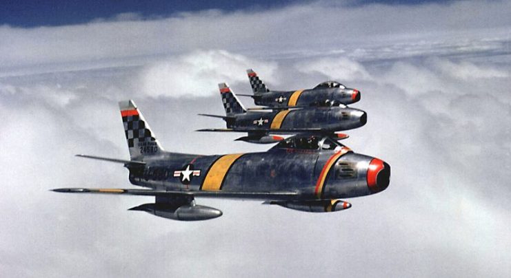 Three F-86s flying in formation over Korea in 1953