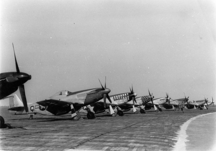 P-51 Mustangs (CV-Q) of the 359th Fighter Group, (LC-D) of the 20th Fighter Group, (LH-V) of the 353rd Fighter group and (C5-Q) of the 357th Fighter Group, at Debden, home of the 4th Fighter Group.