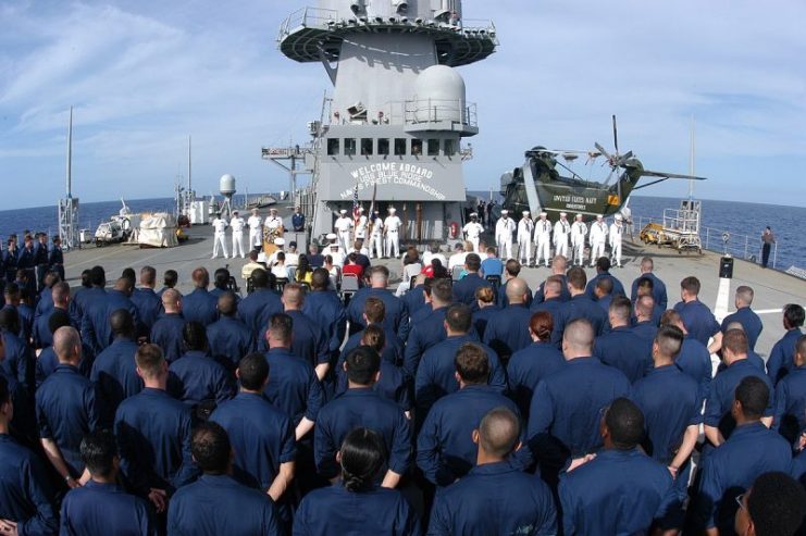 USS Blue Ridge and Commander, 7th Fleet, Sailors stand at parade rest during a Veteran’s Day ceremony held aboard the 7th Fleet command ship.